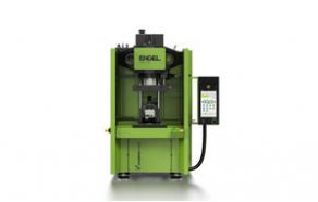 Vertical injection molding machine / electro-hydraulic / rotating table - 3.8 - 6.5 kN | insert