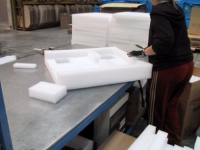 Packing material vibration
