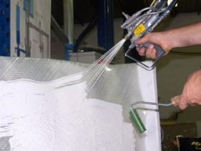 Resin spraying unit