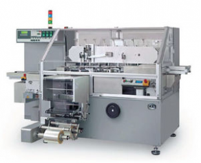 Film packaging machine / continuous-motion / automatic / high-speed - 50 - 150 p/min | RVP