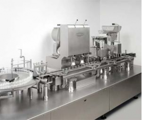 Bottle filler and capper / for granulates / for pharmaceutical products / for powder - max. 18 000 p/h